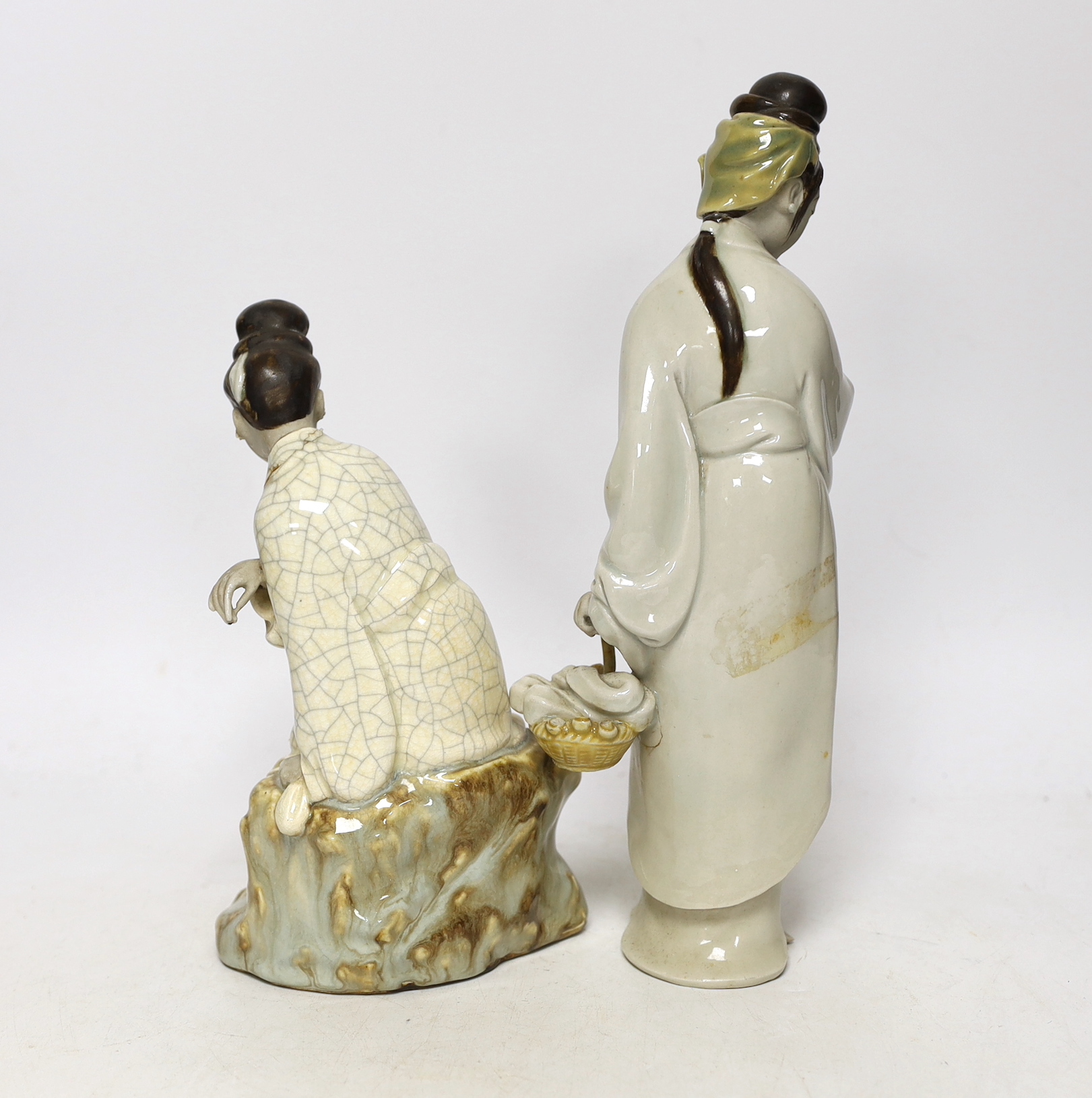 Two Chinese stoneware figures of maidens, 25cm (a.f.)